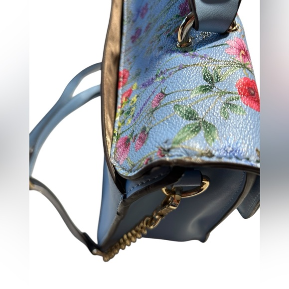 IMAN Global Chic convertible flap handbag with a floral design on the flap - Picture 14 of 14